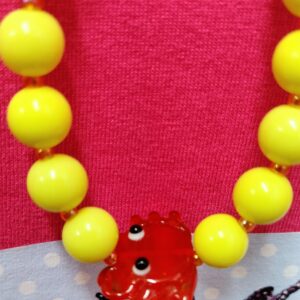 "Crab/yellow necklace"