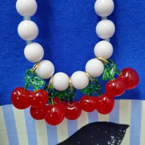 "Cherries/white necklace"
